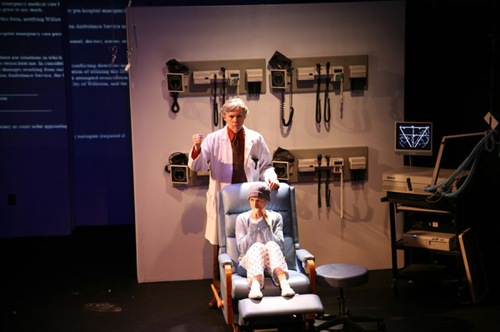 Paul Clay's Set Design, Lighting Design, and Video Design, for the production entitled Not God, Doctor and Patient again.